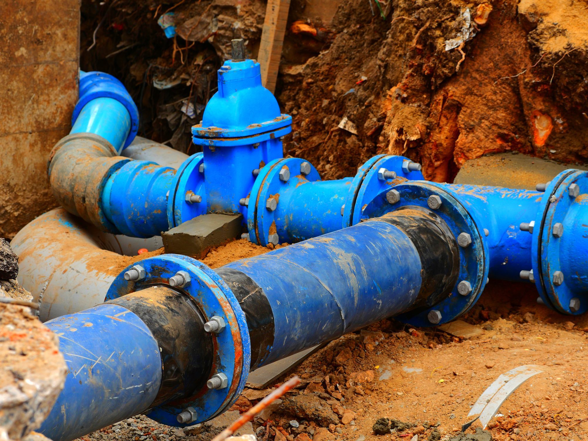 Excavated sewer line during professional repair service