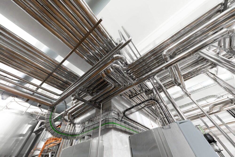 Commercial steel water heater piping system